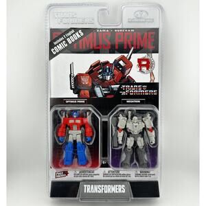 WB Transformers - Page Punchers - Optimus Prime and Megatron 3" Figures w Comic